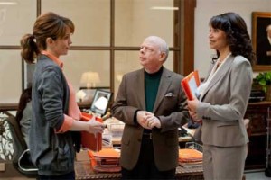 Tina Fey as Portia Nathan, Wallace Shawn as Clarence, Gloria Reuben as Corinne, in 'Admission'