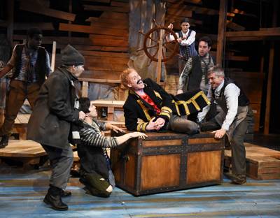 Ed Hoopman as Black Stache with members of the company in 'Peter and the Starcatcher'