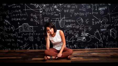 Perplexity in front of a blackboard full of equations
