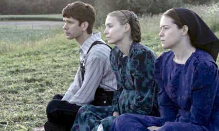 Ben Whishaw as August, Claire Foy as Salome, Rooney Mara as Ona in 'Women Talking'