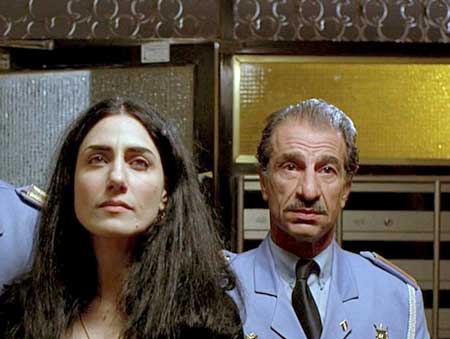 Ronit Elkabetz as Dina and Sasson Gabai as Tewfiq in the film 'The Band's Visit (2007)