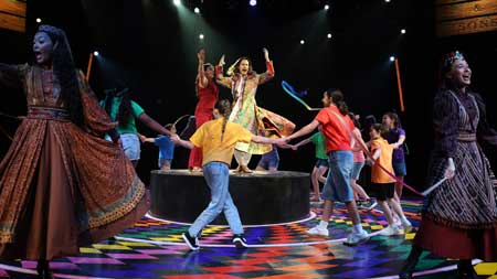 Nikita Burshteynr as Joseph with the Company in 'Joseph and the Amazing Technicolor Dreamcoat'